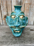 # 55 Turquoise Glazed 26th Anniversary 9” Face Jug by Crystal King