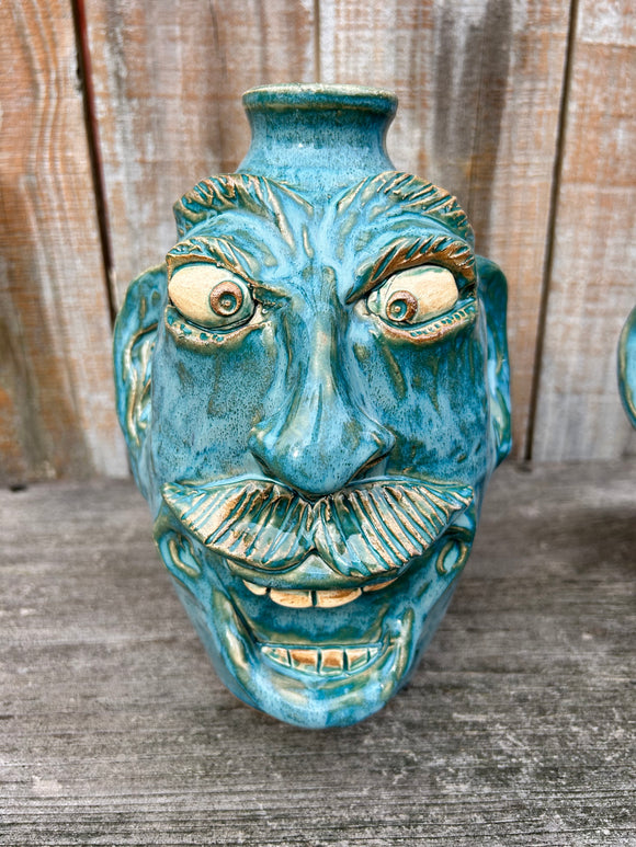 # 54 Turquoise Glazed 26th Anniversary 9” Face Jug by Crystal King