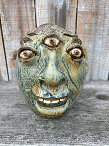 9" cyclops face jug  by Crystal King