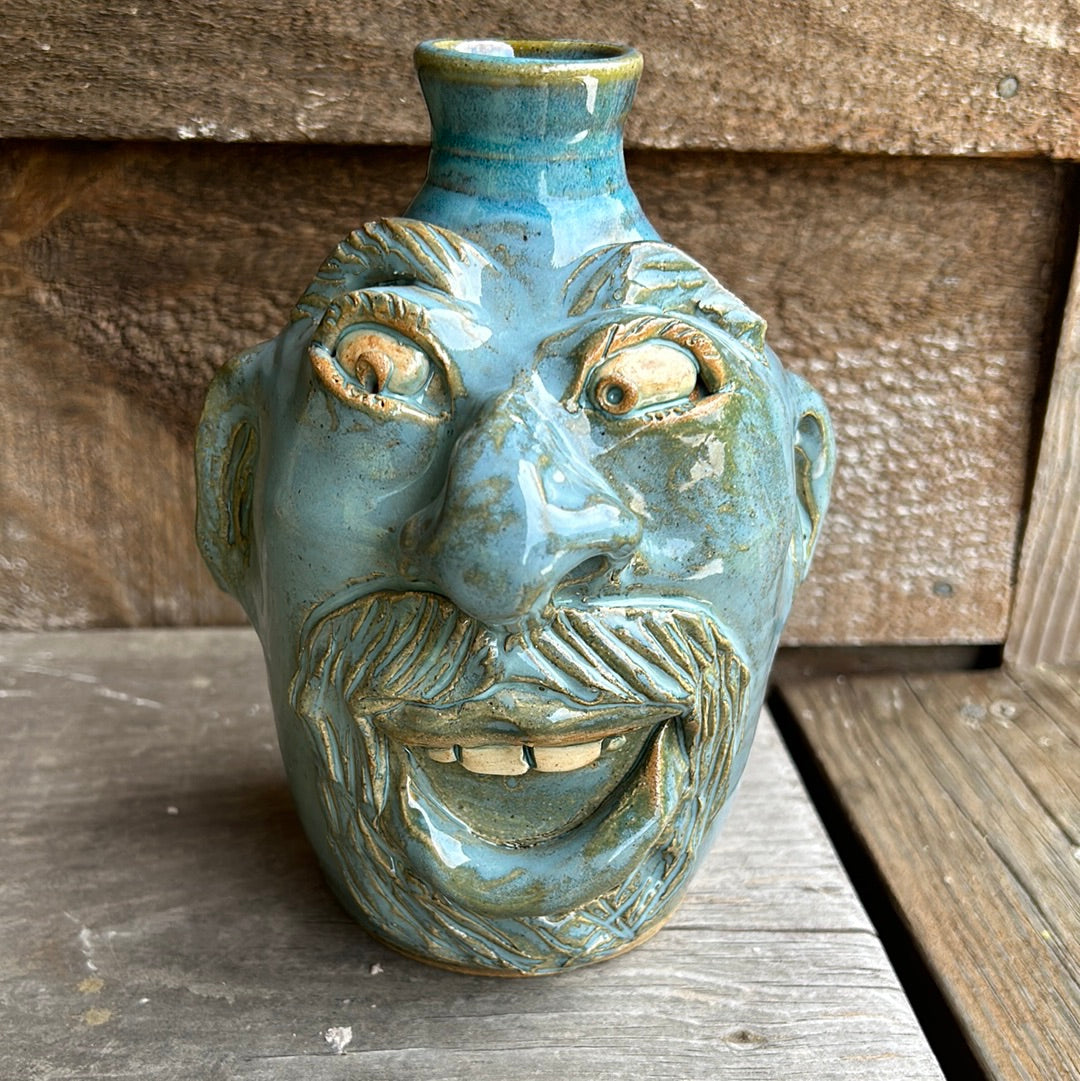 Face selling jug